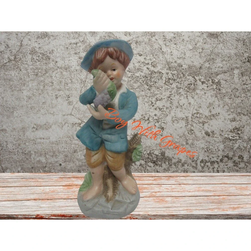 Vintage Barefoot Boy Holding Grapes Figurine Blue Hat Blue Coat 6 1/2 inches